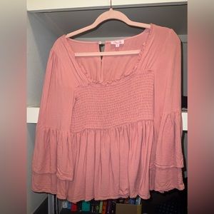 Wide sleeved pink shirt